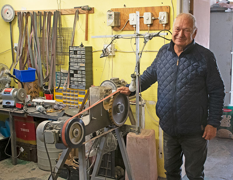 Arno Bernard Sr. in his knifemaking studio